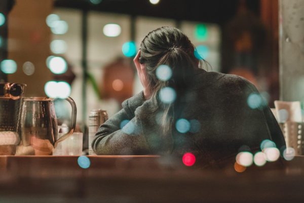 Woman stressed after drinking alcohol