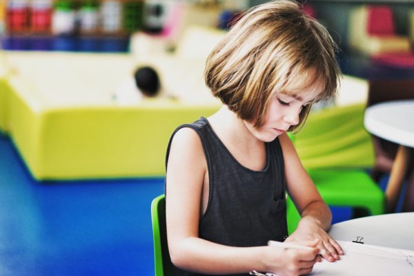 A girl making drawing