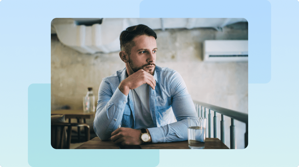 a man sitting alone, deep in thought