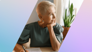 A woman smiling and looking to the side