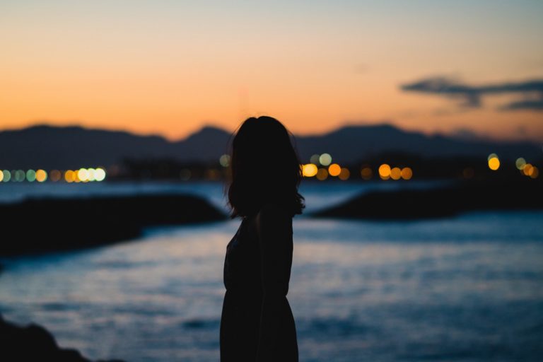 Woman standing alone