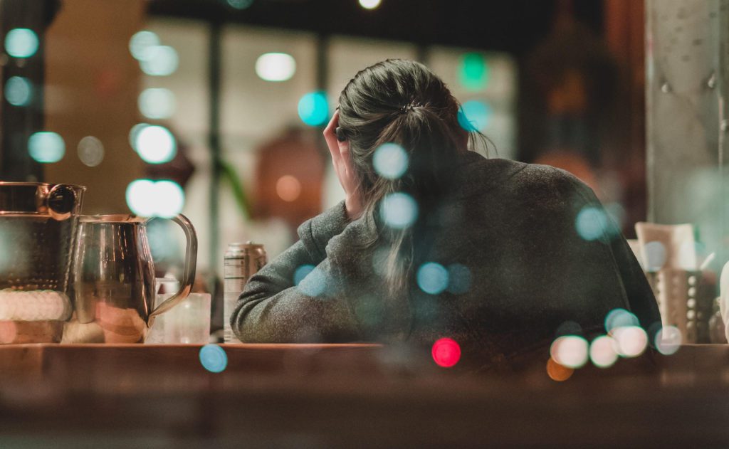 Woman stressed after drinking alcohol