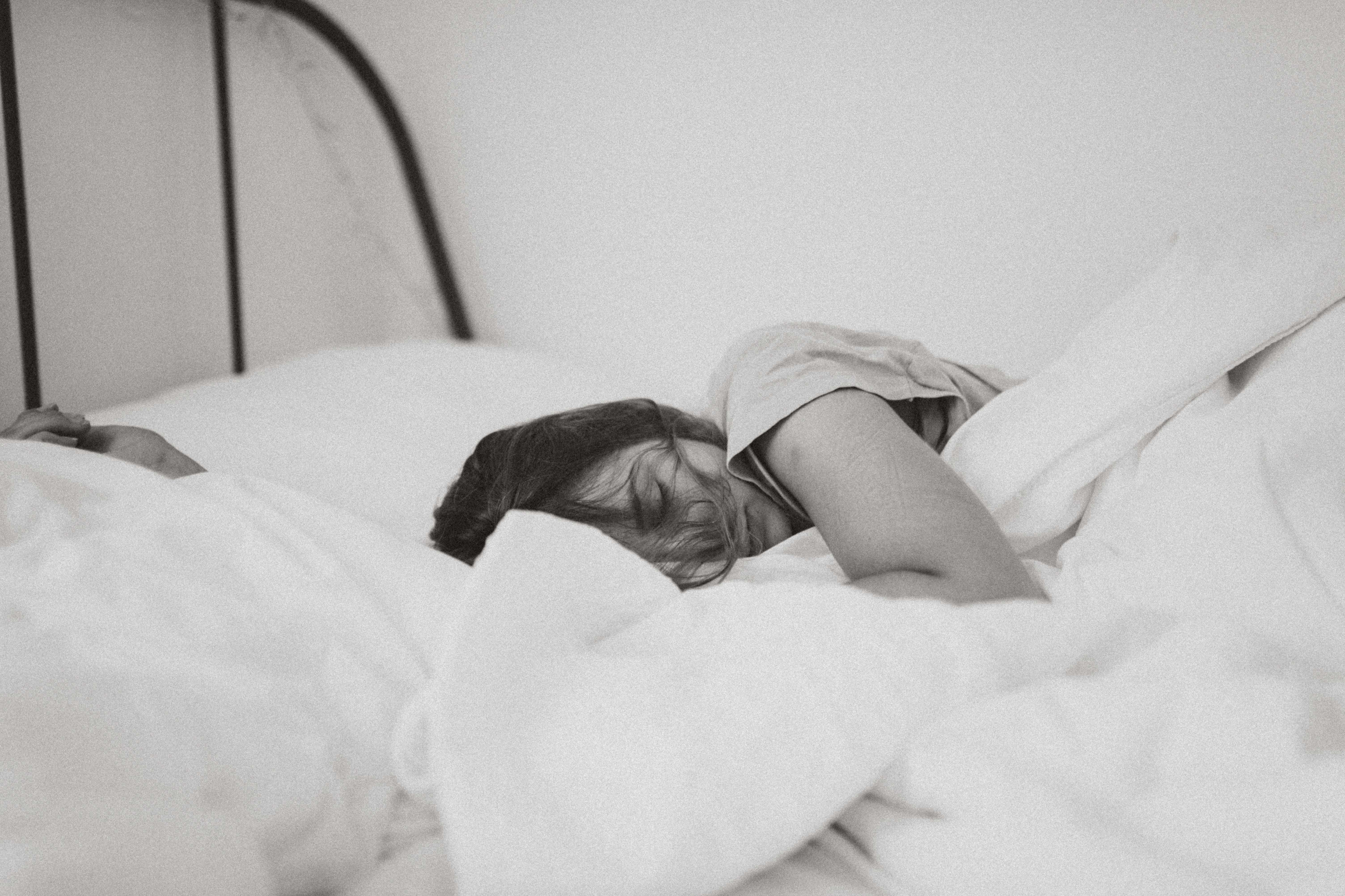 A girl sleeping on bed