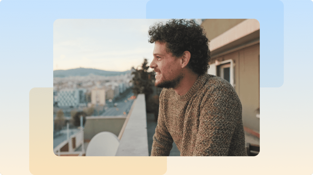 a person standing outside on a balcony