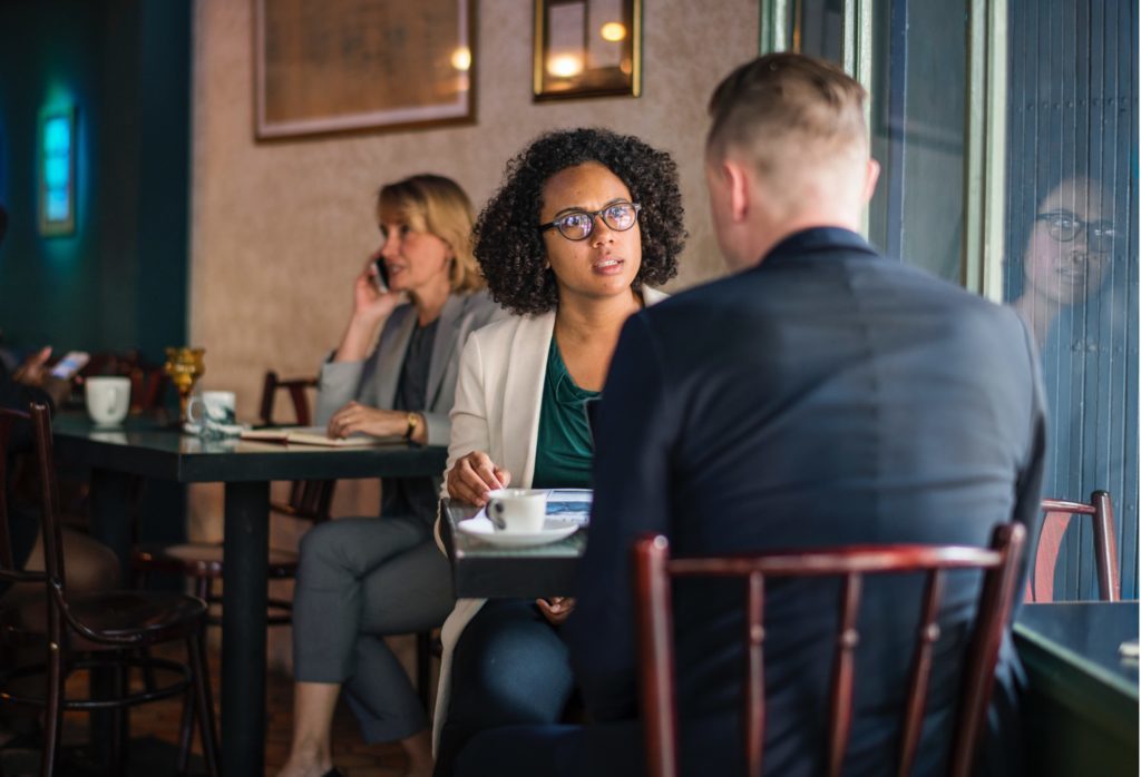 A man and woman discussing