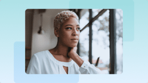 Woman looking through a window.